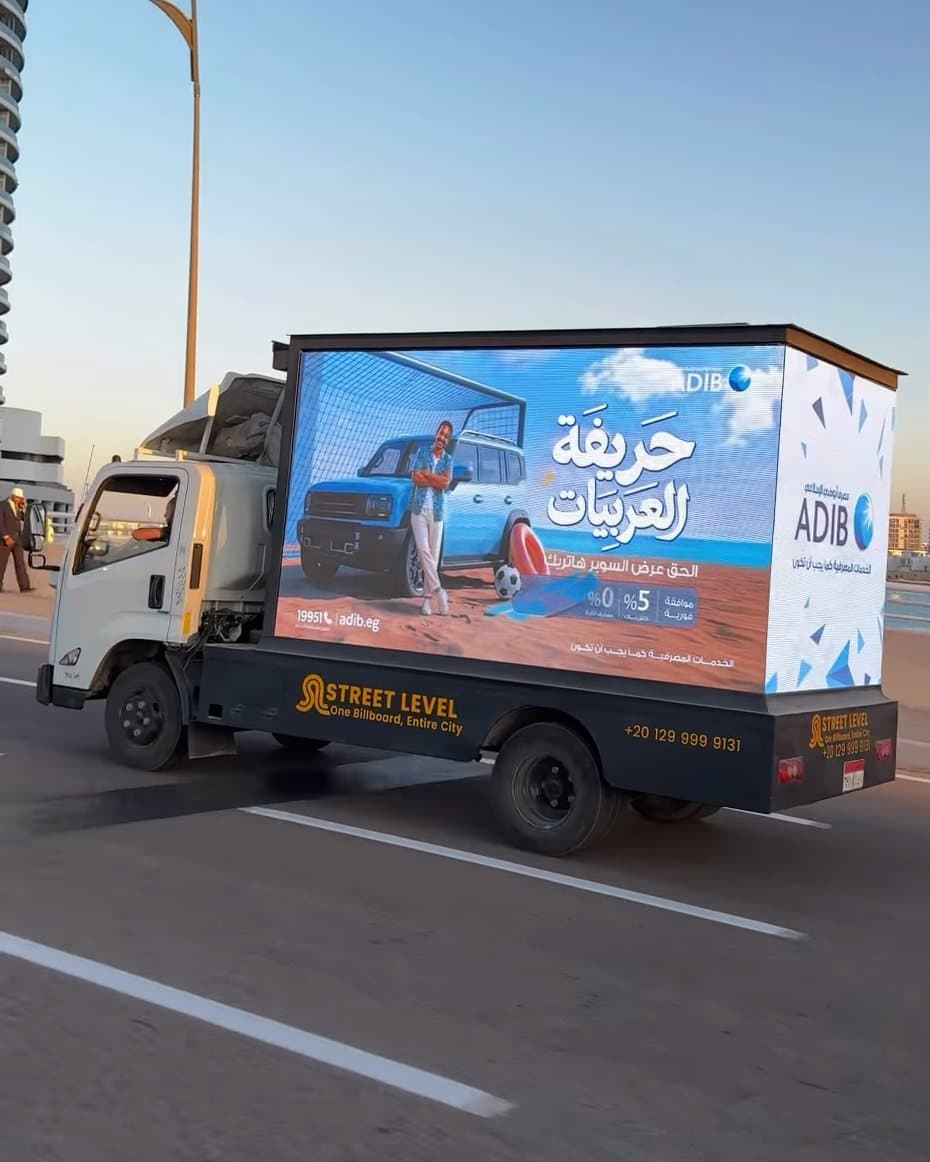 Street Level truck showing an ADIB ad