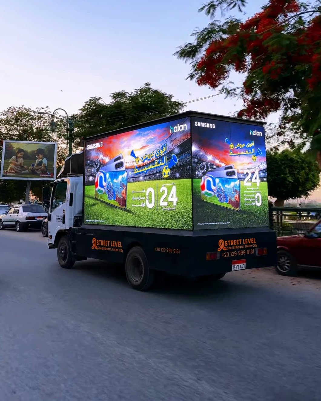 Street Level truck showing a Samsung ad on its side and rear screens
